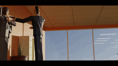 a man in a suit is holding a gun in an office
