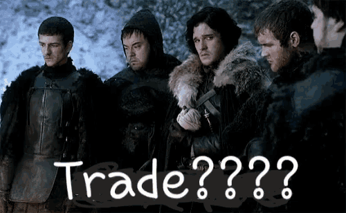 a group of men are standing next to each other with the word trade written in white