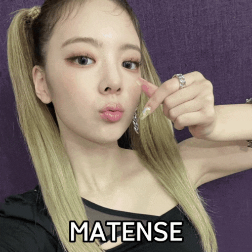 a picture of a woman with the word matense on the bottom right