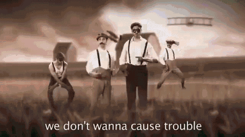 a group of men are dancing in a field with the words `` we don 't wanna cause trouble '' written on the bottom