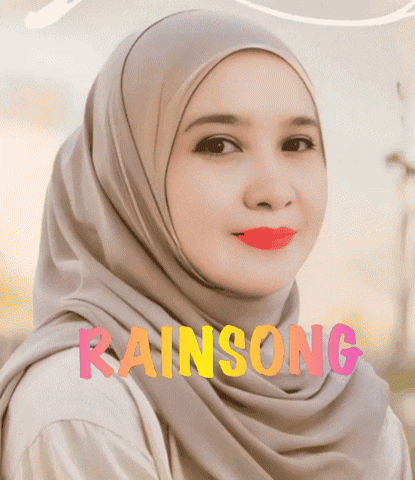 a woman wearing a hijab has the word rainsong written on her face