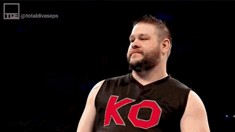 a wrestler is being thrown into the air by another wrestler .