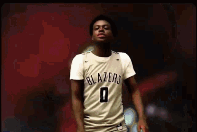 a man in a blazers jersey with the number 0