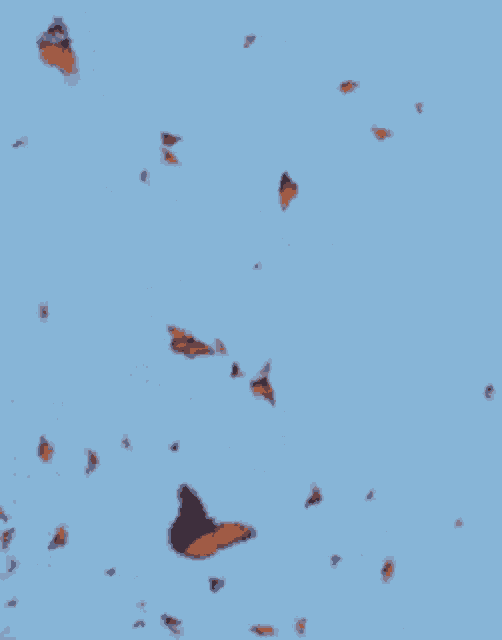 a group of butterflies are flying in the sky