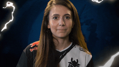a woman is wearing a black and white shirt with red bull on the sleeves