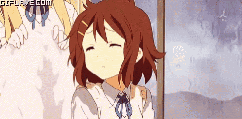 a gif of a girl with her eyes closed and the words gifwave.com at the bottom