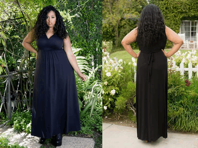 a woman in a black dress is standing in front of a white picket fence