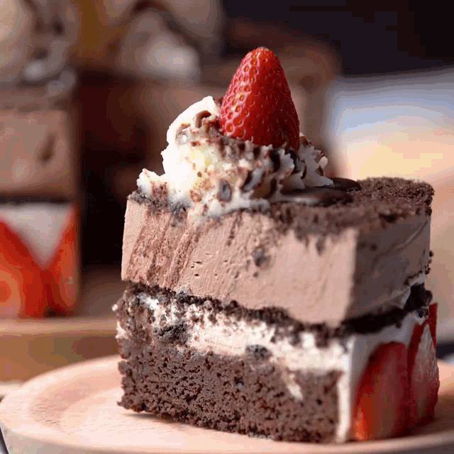 a slice of cake with a strawberry on top