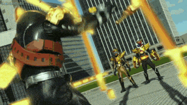 a group of superheros are fighting each other in front of a large building .