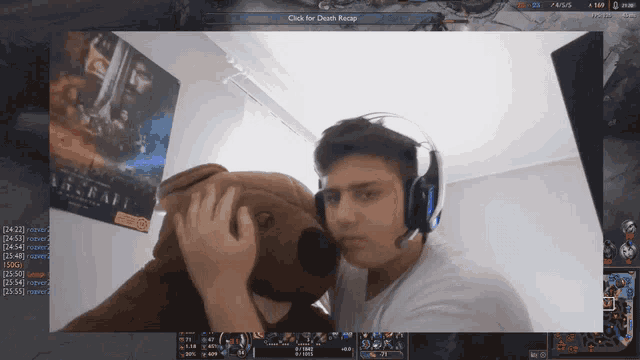 a man wearing headphones is holding a teddy bear in front of a screen that says click for death recap