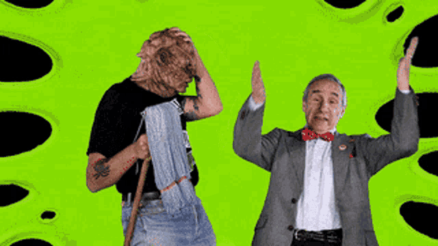 a man with a mop and a man in a suit are standing next to each other on a green background