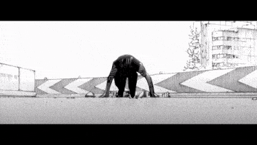 a black and white drawing of a person standing on their head