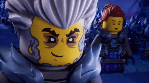 two lego figures are standing next to each other and one has a beard