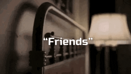 a close up of a bed with the words `` friends '' on it .