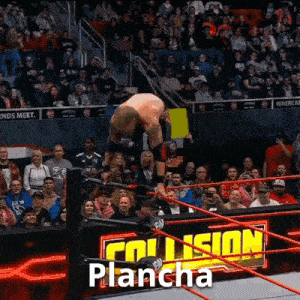 a man in a wrestling ring with a sign that says plancha