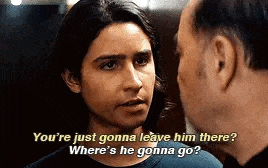 a man and a woman are talking to each other and the woman is asking the man where he is going .