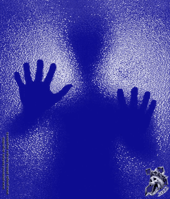 a picture of a person 's hands on a blue background with the year 2012