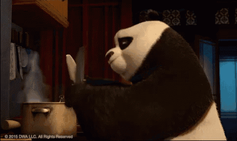 a panda bear is holding a knife over a pot in a kitchen