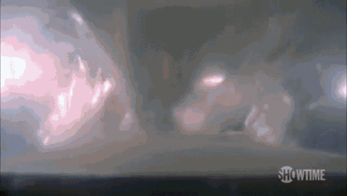 a close up of a cloudy sky with the words showtime on the bottom