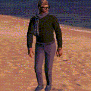 a man wearing sunglasses and a scarf stands on a beach