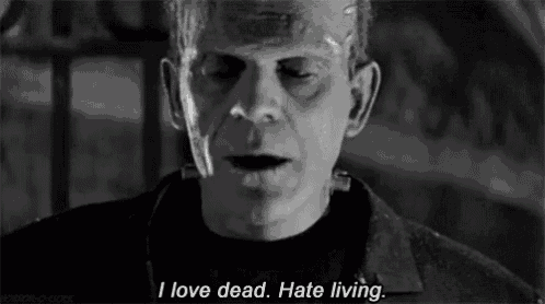 a black and white photo of frankenstein with the words `` i love dead . hate living '' .