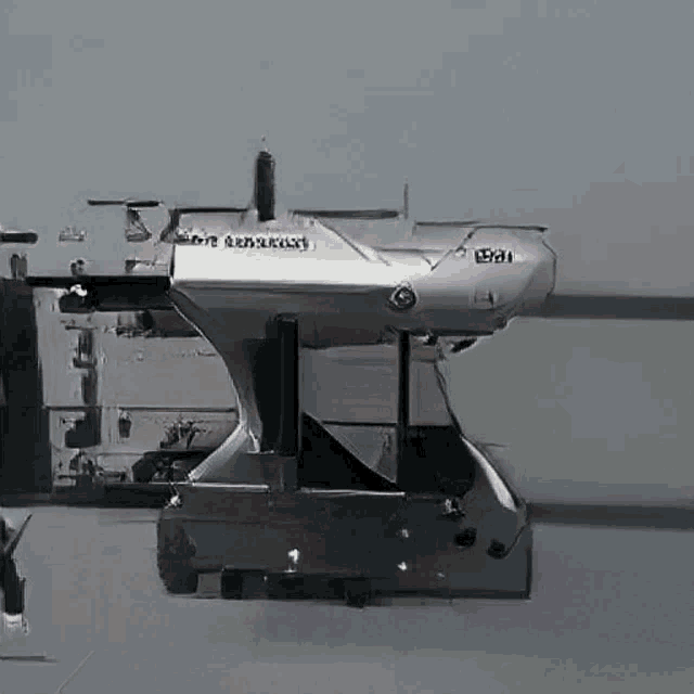 a gray airplane with the letters ea on the side