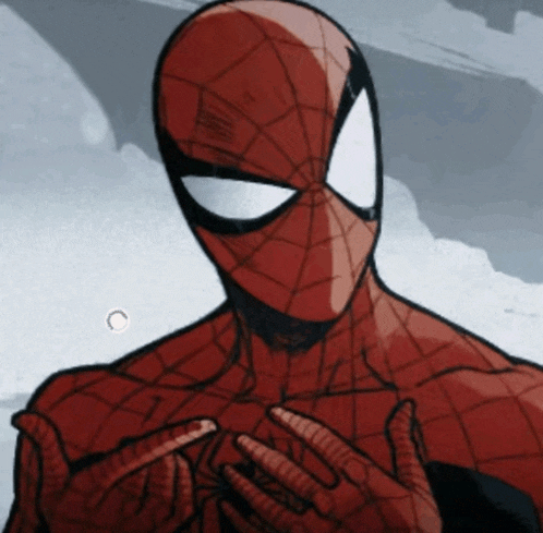 a close up of a spider man 's face and chest