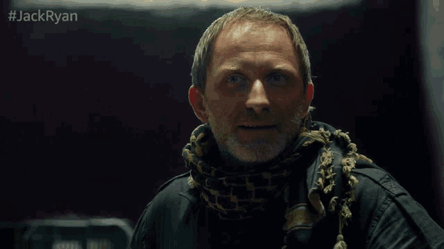 a man in a scarf says thank you