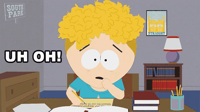a cartoon character sitting at a desk with a sign that says south park