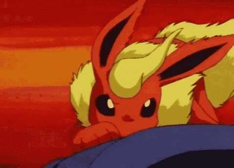 a close up of a cartoon eevee laying on a person 's lap .