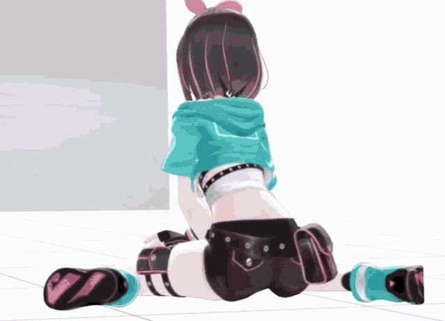 a girl in a blue shirt and black shorts is kneeling down