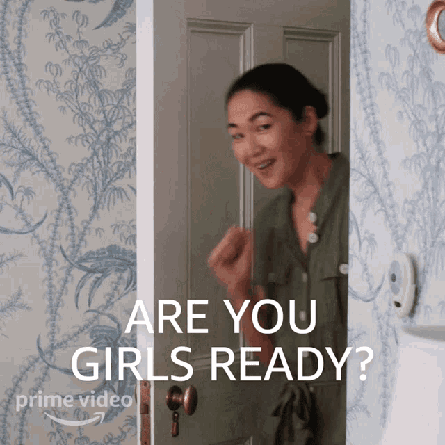 a woman standing in a doorway with the words " are you girls ready " written on the bottom