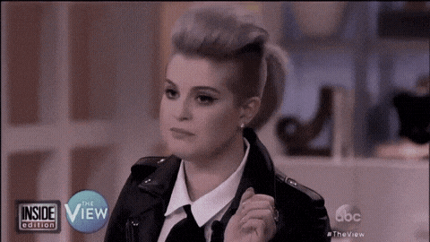 a woman in a leather jacket is on a tv show called the view