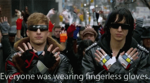 Andy Samberg Wearing Fingerless Gloves GIF - Andy Samberg Wearing Fingerless Gloves Julian Casablancas GIFs