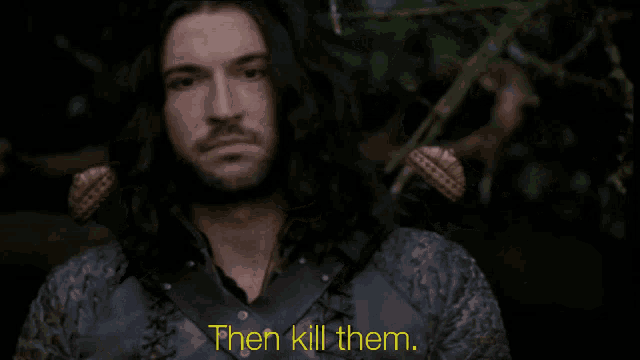 a man with long hair and a beard is saying " then kill them "