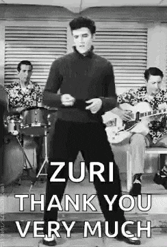 a black and white photo of elvis presley dancing in front of a band with the words `` azuri thank you very much '' .