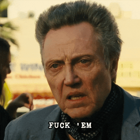 a close up of a man 's face with the words " fuck ' em " below him