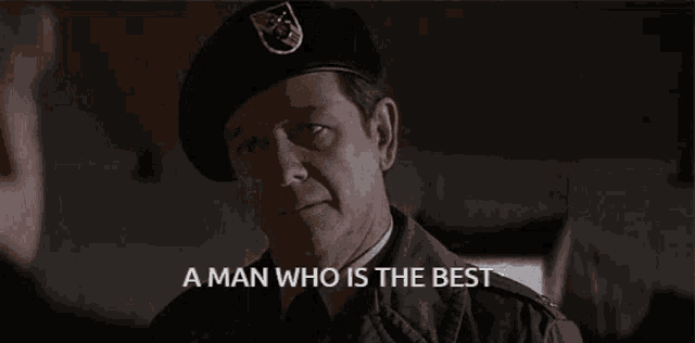 a man in a military uniform is talking to another man and says a man who is the best