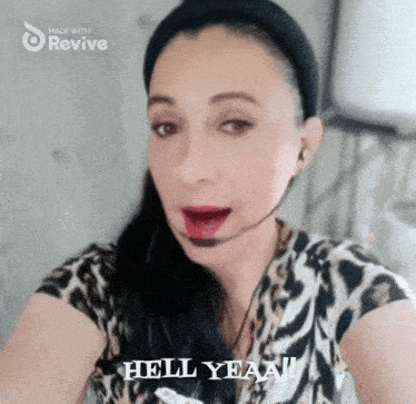 a woman wearing a headset says hello yeaa
