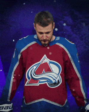a hockey player is surrounded by the word goal on a purple background