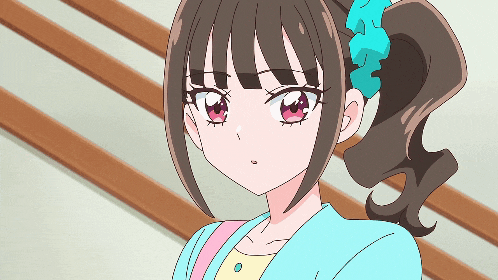 a girl with a blue bow in her hair