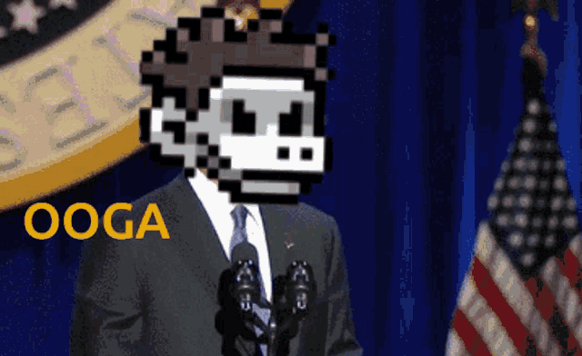 a man in a suit and tie stands in front of a microphone with the word ooga written in yellow