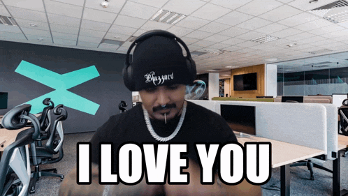 a man wearing headphones says " i love you "