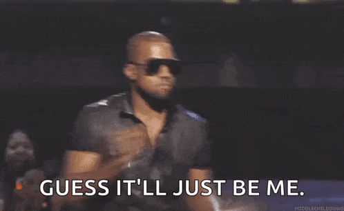 a man wearing sunglasses and a black shirt is holding a microphone and says guess it 'll just be me .