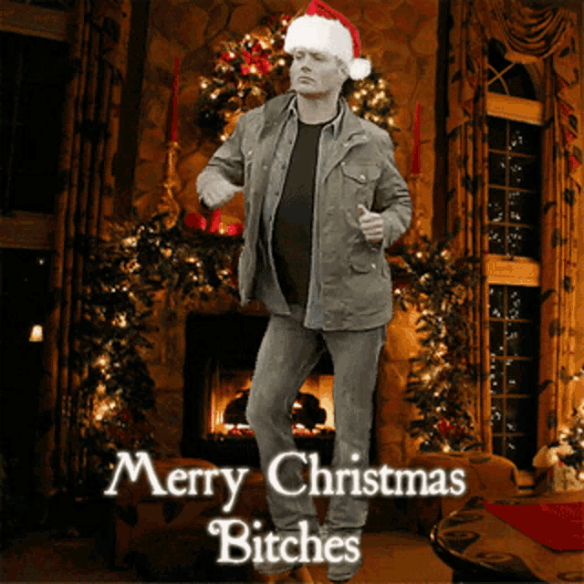 a man in a santa hat dancing in front of a fireplace with the words merry christmas bitches