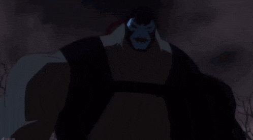a cartoon character with a skull on his face stands in the dark