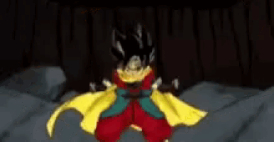 a cartoon character with a yellow cape is standing on a rocky surface .