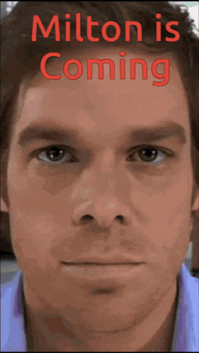 a close up of a man 's face with the words milton is coming