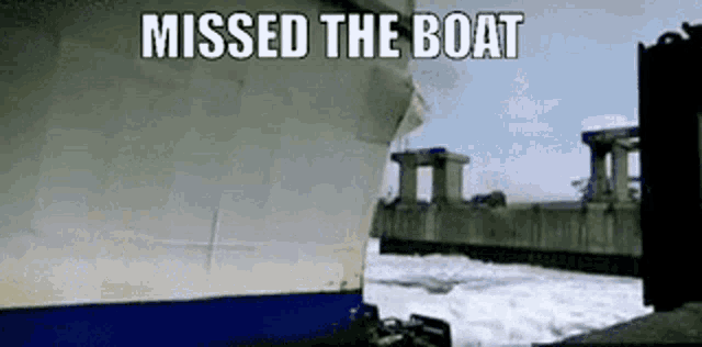a boat is going under a bridge with the words `` missed the boat '' written on the bottom .
