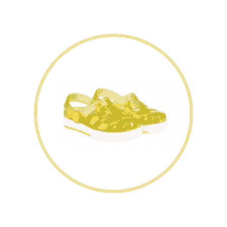 a pair of yellow sandals that say igor on them